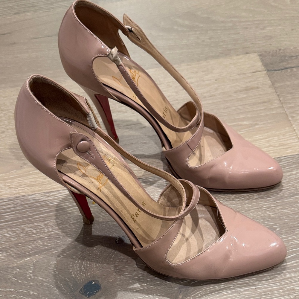 Christian Louboutin Blush Patent Leather T-Strap Pumps with Red Sole